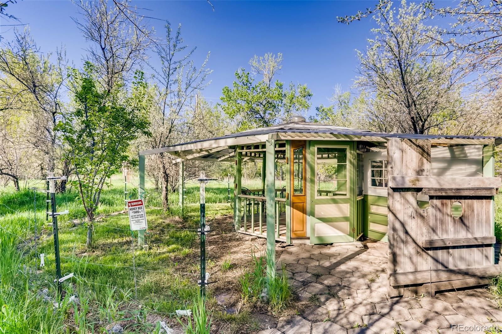 1521 Marshall Road Boulder, CO 80305 - Photo 27 of 40 a view of a house with backyard and sitting area