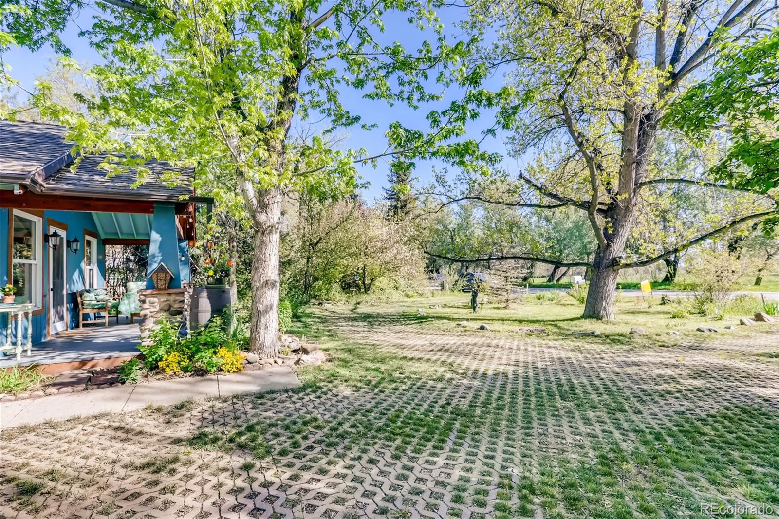 1521 Marshall Road Boulder, CO 80305 - Photo 30 of 40 a view of a yard with plants and trees