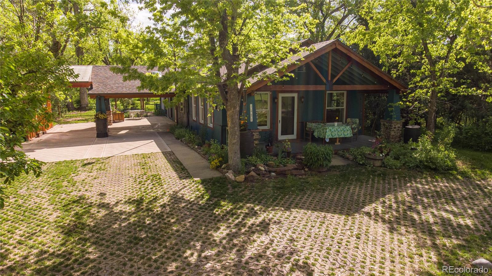1521 Marshall Road Boulder, CO 80305 - Photo 40 of 40 a front view of a house with a yard
