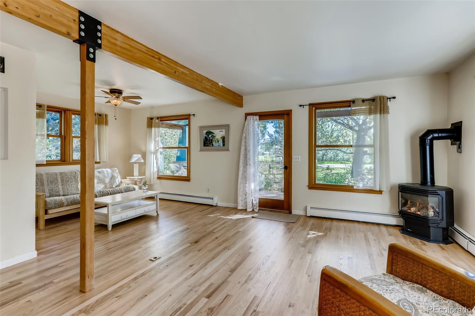 1521 Marshall Road Boulder, CO 80305 - Photo 6 of 40 a living room with furniture and a wooden floor