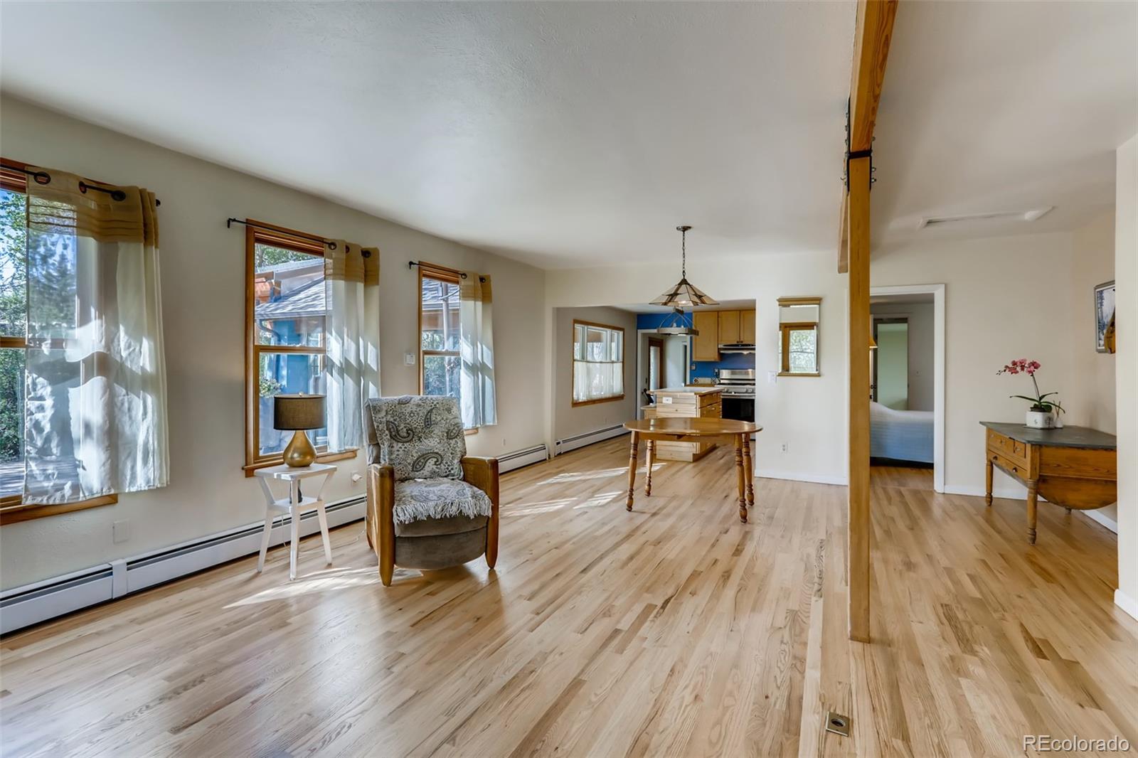 1521 Marshall Road Boulder, CO 80305 - Photo 7 of 40 a living room with furniture and a wooden floor
