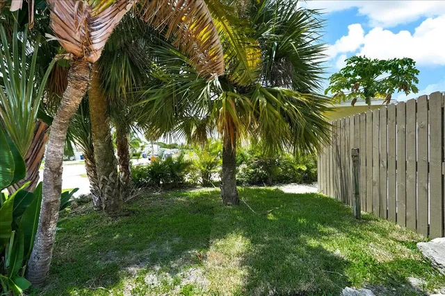 wooden floor with white walls