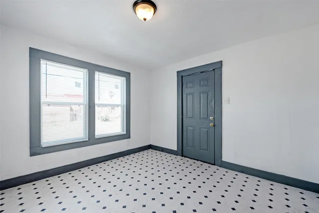 an empty room with windows