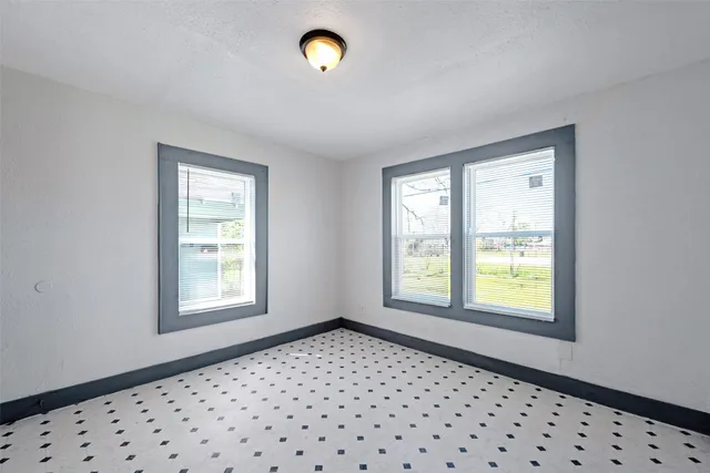 a view of an empty room and window