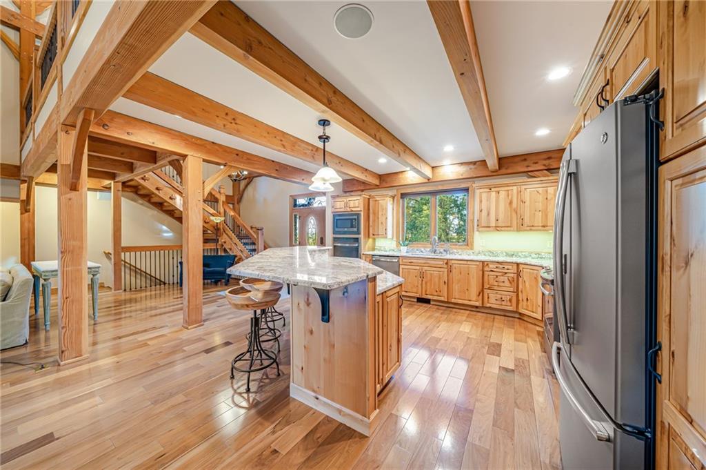 2780 Ipnar Road Irwin, PA 15642 - Photo 13 of 49 a view of a porch with wooden floor and furniture
