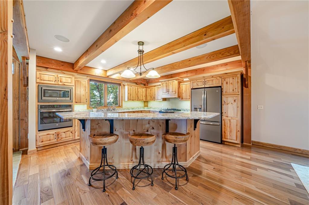 2780 Ipnar Road Irwin, PA 15642 - Photo 14 of 49 a kitchen with a table and chairs in it