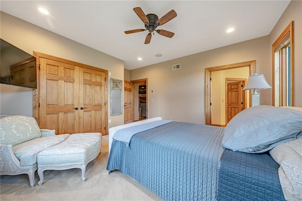 2780 Ipnar Road Irwin, PA 15642 - Photo 19 of 49 a bedroom with a bed and a couch