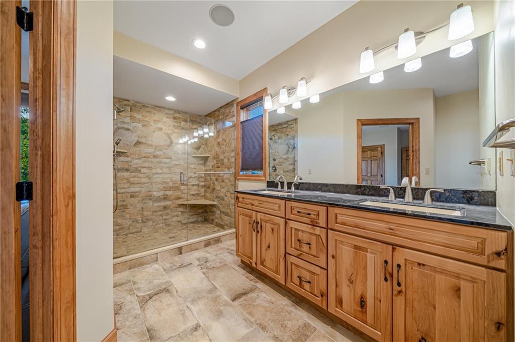 2780 Ipnar Road Irwin, PA 15642 - Photo 20 of 49 a bathroom with sinks mirror and a shower
