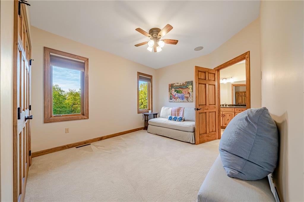 2780 Ipnar Road Irwin, PA 15642 - Photo 21 of 49 a living room with furniture and a chandelier