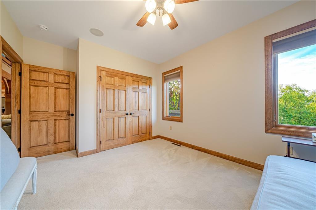2780 Ipnar Road Irwin, PA 15642 - Photo 22 of 49 an empty room with windows and closet
