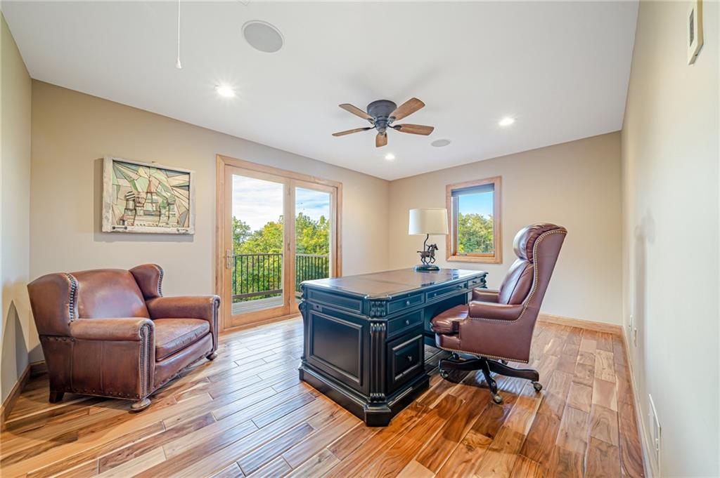 2780 Ipnar Road Irwin, PA 15642 - Photo 28 of 49 a living room with furniture a wooden floor and a window