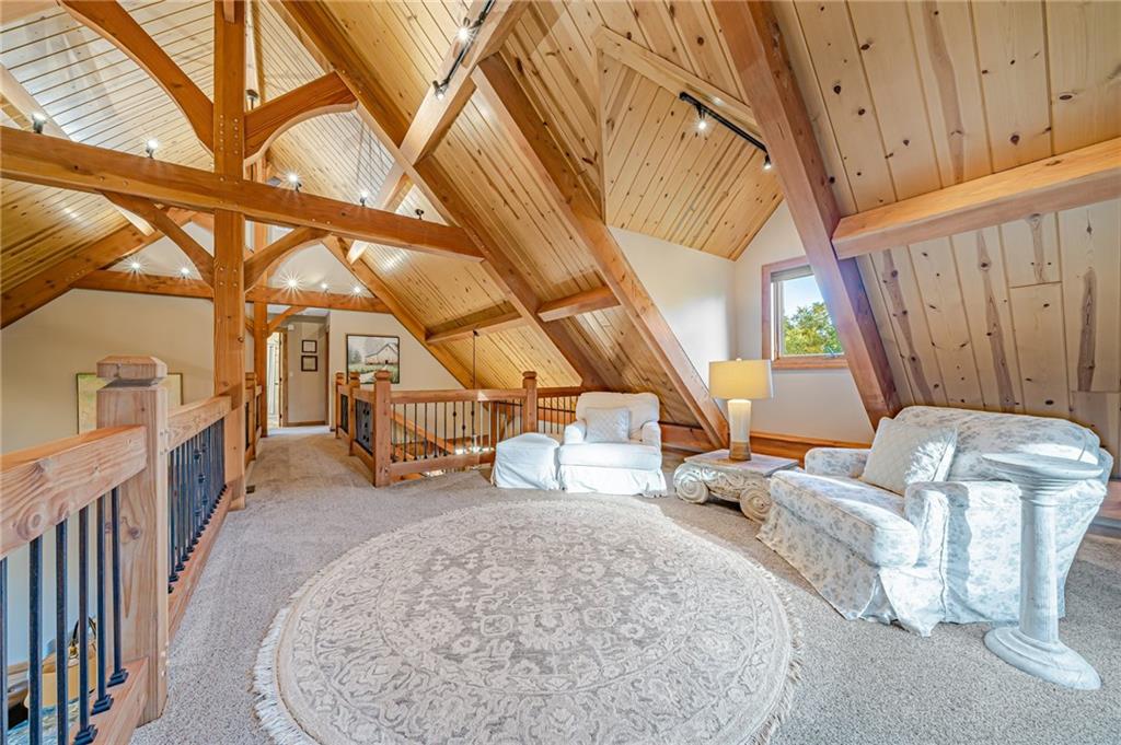 2780 Ipnar Road Irwin, PA 15642 - Photo 33 of 49 a view of a room with wooden floor and stairs