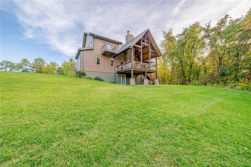 2780 Ipnar Road Irwin, PA 15642 - Photo 45 of 49 a front view of a house with garden