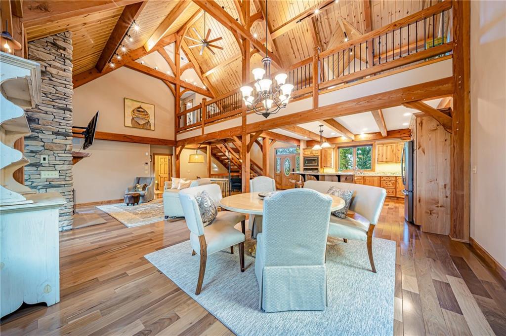 2780 Ipnar Road Irwin, PA 15642 - Photo 6 of 49 a dining room with wooden floor table and chairs