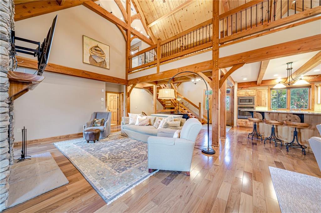 2780 Ipnar Road Irwin, PA 15642 - Photo 7 of 49 a living room with couches and coffee table with wooden floor