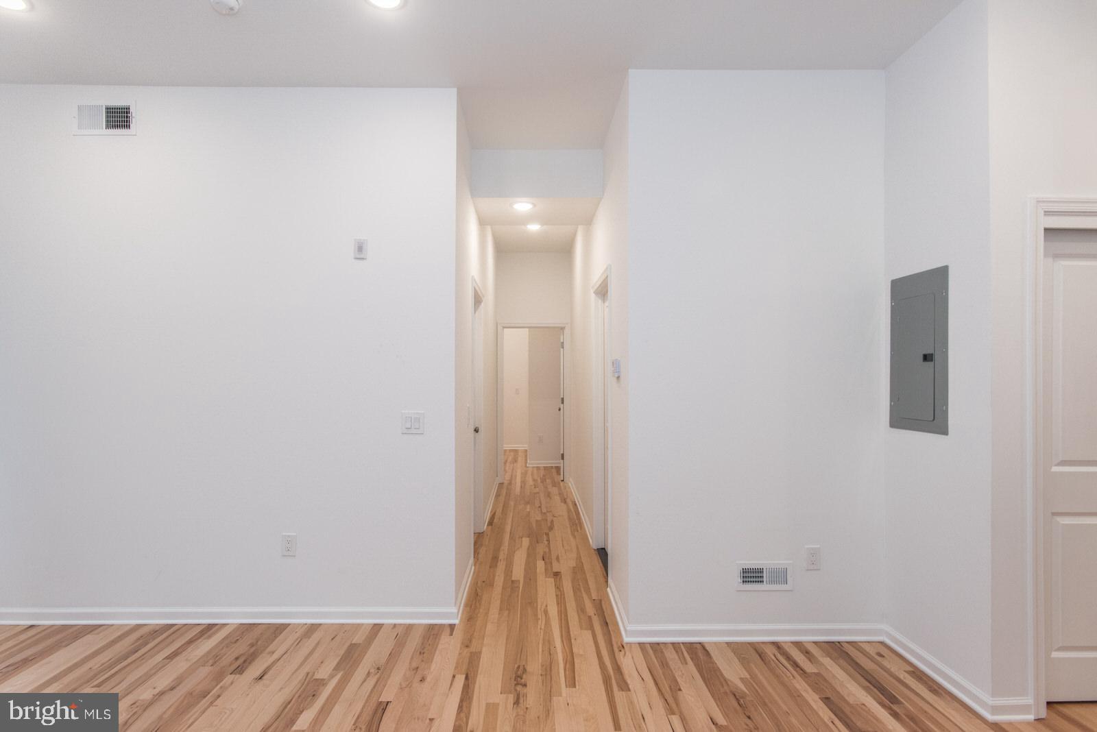 315 North Preston Street, Unit 101 Philadelphia, PA 19104 - Photo 12 of 26 a view of a room with wooden floor