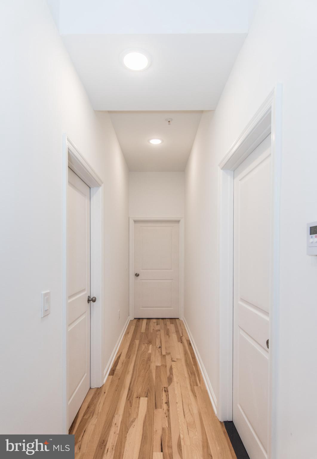315 North Preston Street, Unit 101 Philadelphia, PA 19104 - Photo 13 of 26 a view of a room with wooden floor and white walls