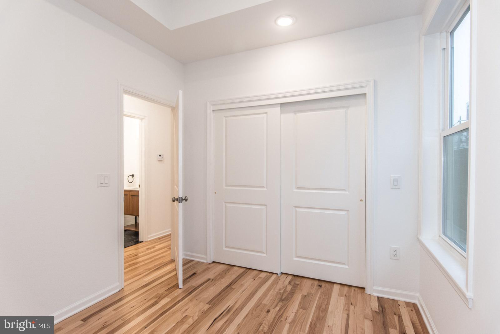 315 North Preston Street, Unit 101 Philadelphia, PA 19104 - Photo 16 of 26 a view of empty room with wooden floor