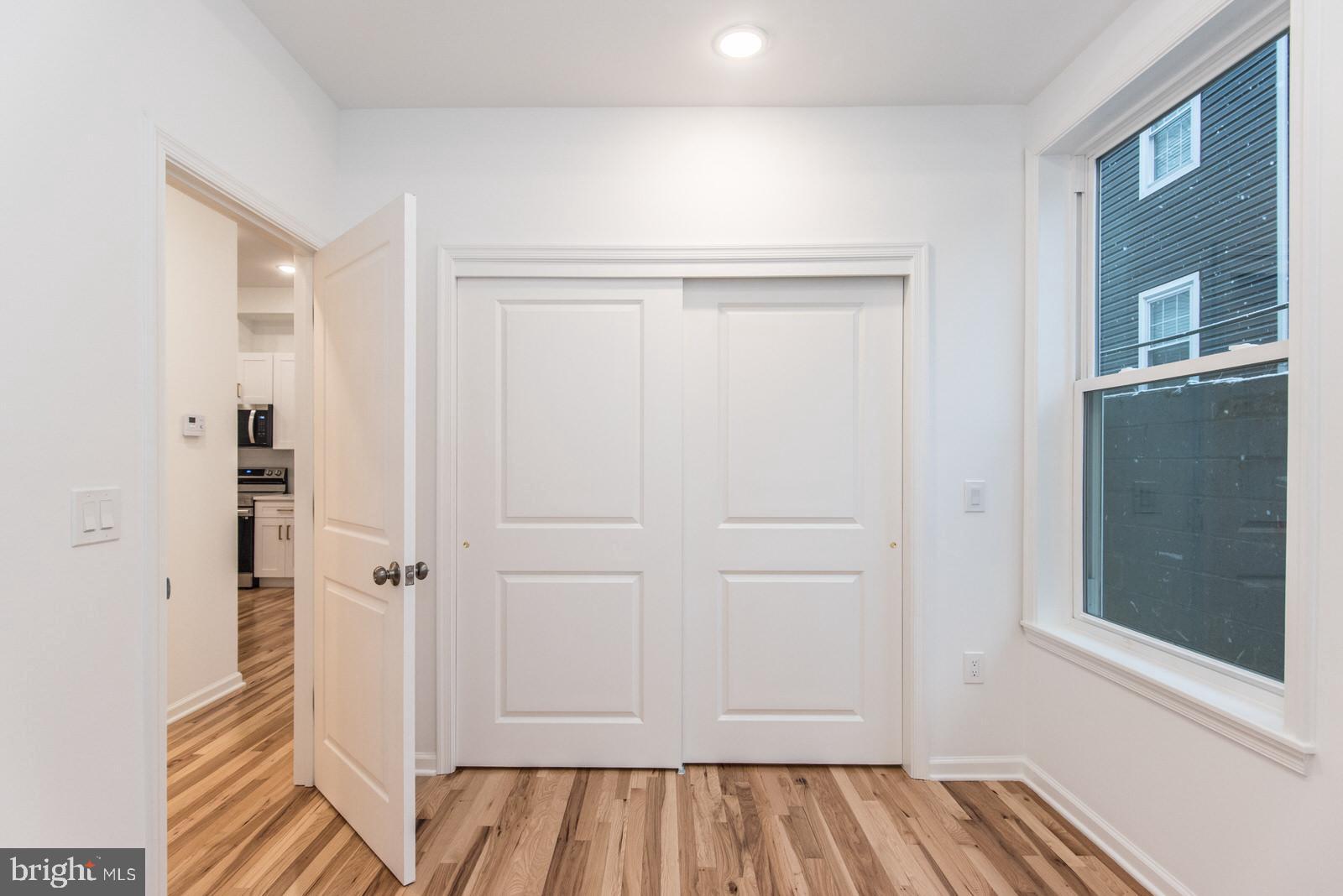 315 North Preston Street, Unit 101 Philadelphia, PA 19104 - Photo 17 of 26 a view of a livingroom with wooden floor
