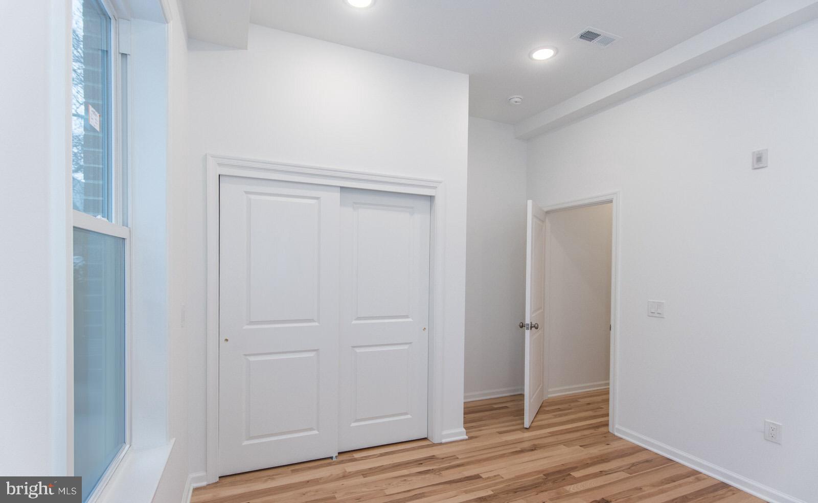 315 North Preston Street, Unit 101 Philadelphia, PA 19104 - Photo 23 of 26 a view of room with wooden floor