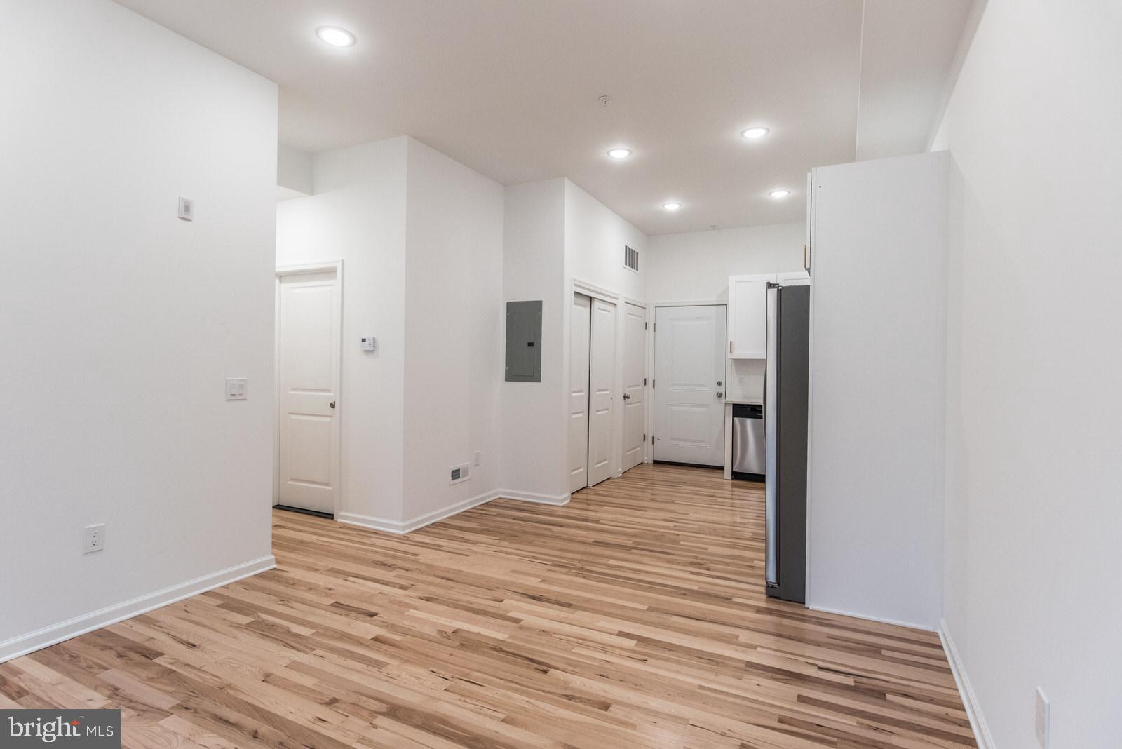 315 North Preston Street, Unit 101 Philadelphia, PA 19104 - Photo 7 of 26 a view of a livingroom with wooden floor