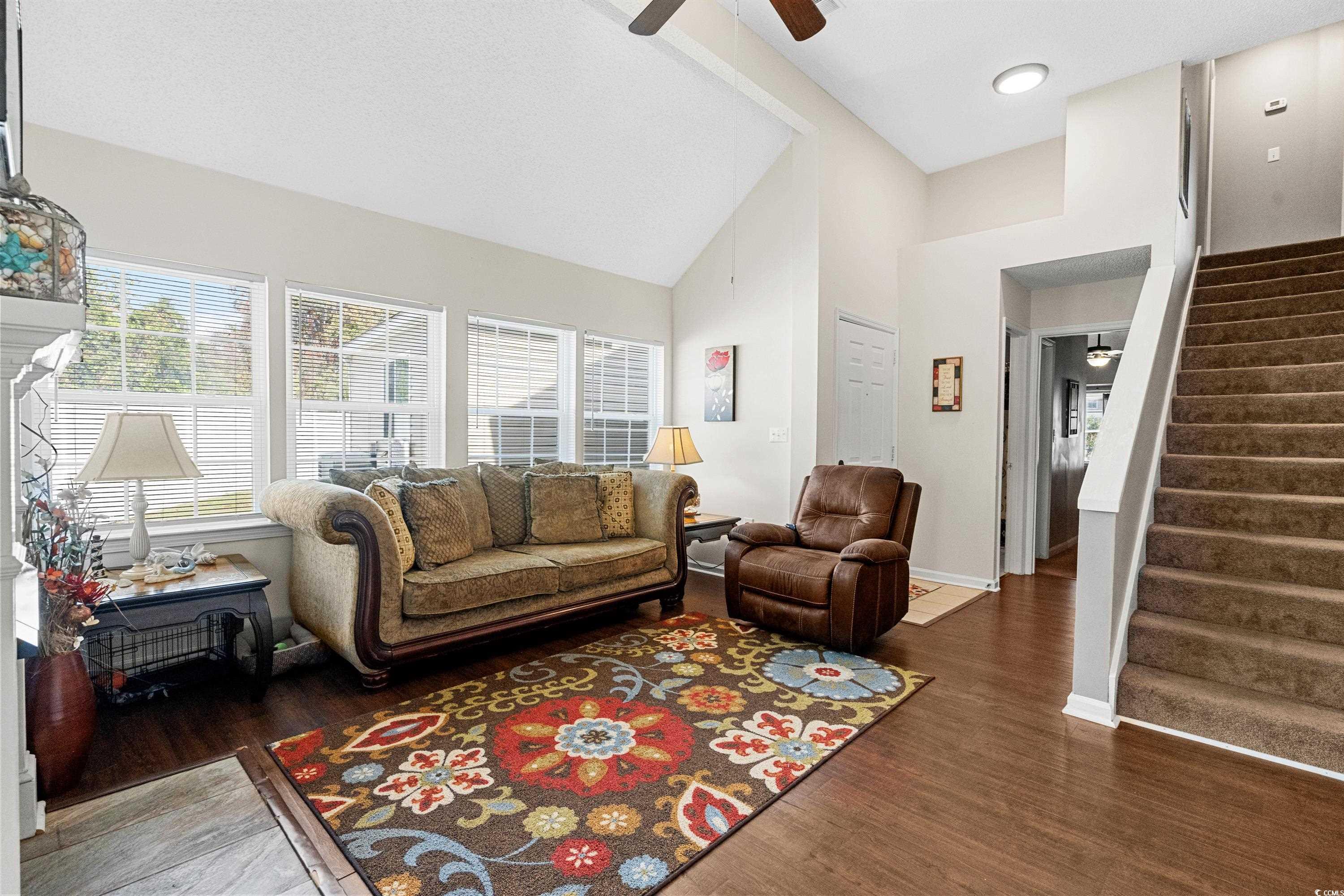 133 Whitehaven Court Myrtle Beach, SC 29577 - Photo 12 of 31 Living room with ceiling fan, high vaulted ceiling