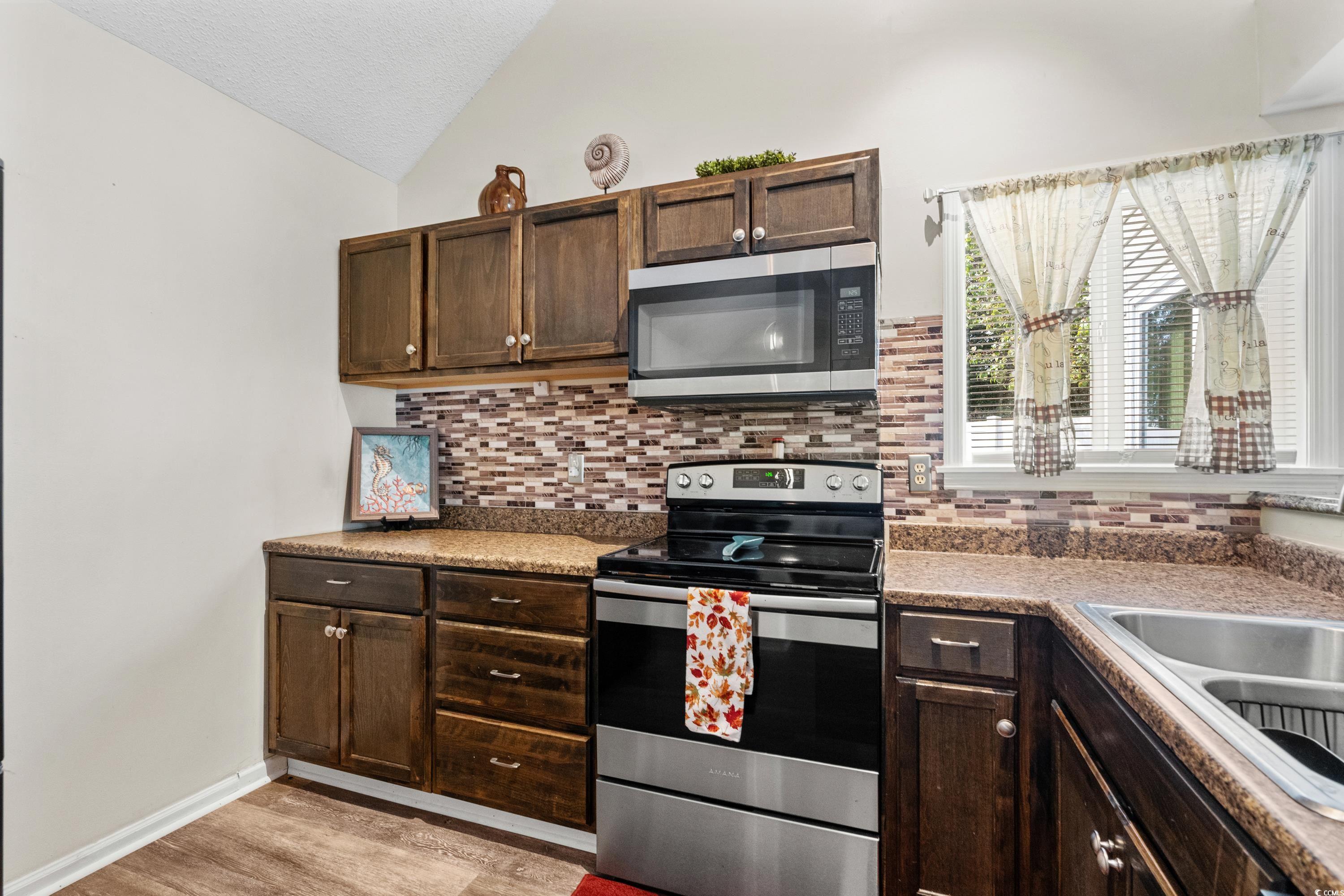 133 Whitehaven Court Myrtle Beach, SC 29577 - Photo 18 of 31 Kitchen with light hardwood / wood-style flooring,