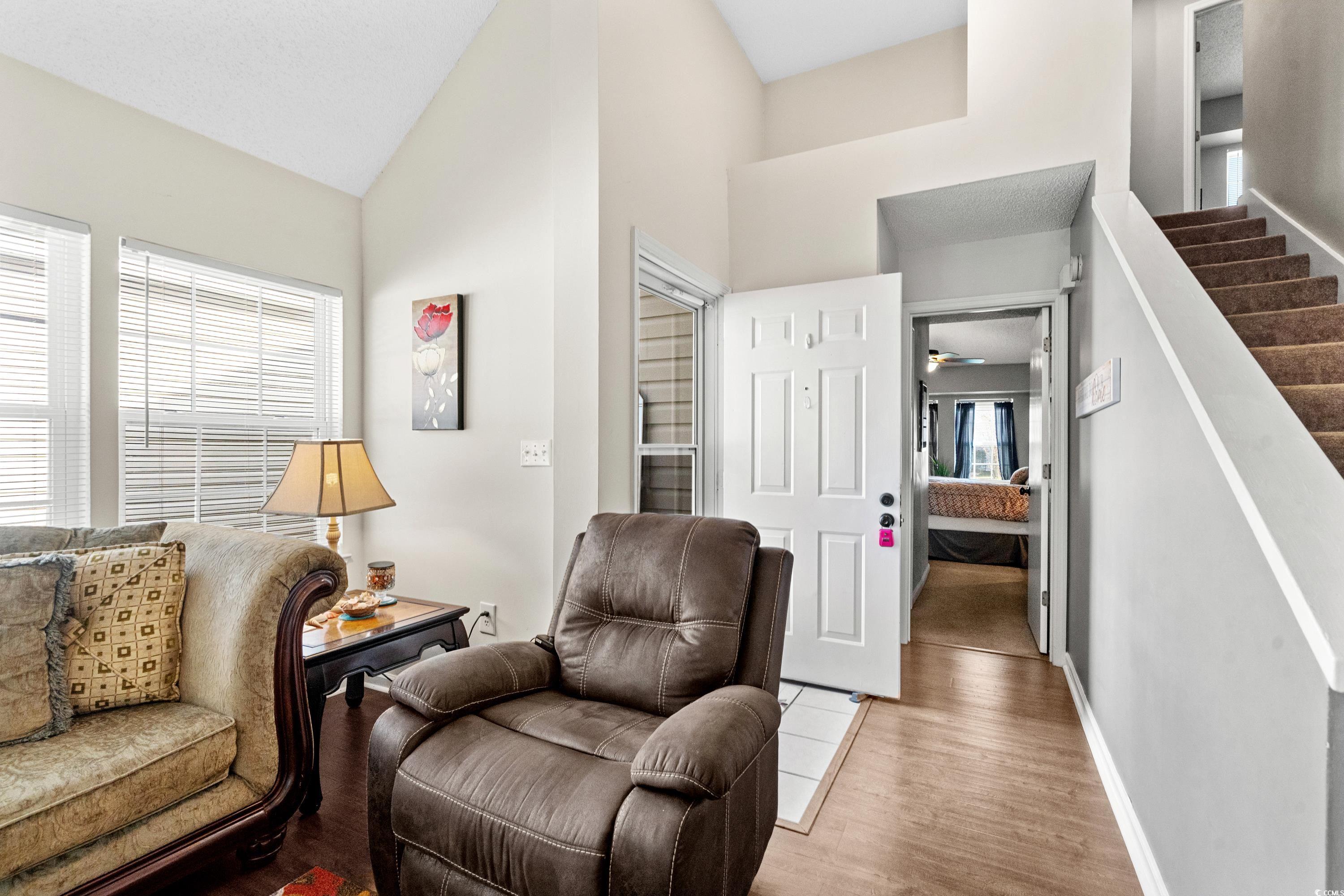 133 Whitehaven Court Myrtle Beach, SC 29577 - Photo 28 of 31 Sitting room with ceiling fan, high vaulted ceilin
