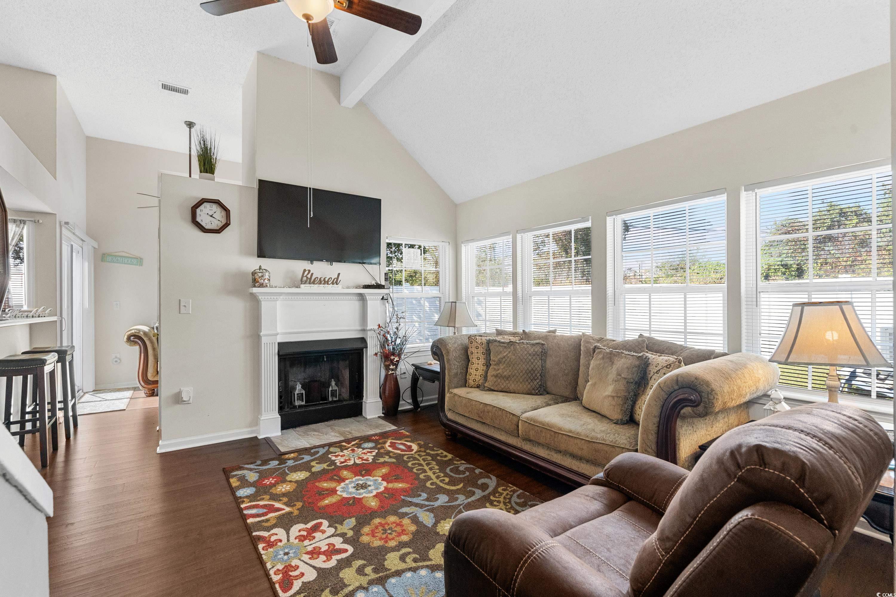 133 Whitehaven Court Myrtle Beach, SC 29577 - Photo 10 of 31 Living room with ceiling fan, a healthy amount of