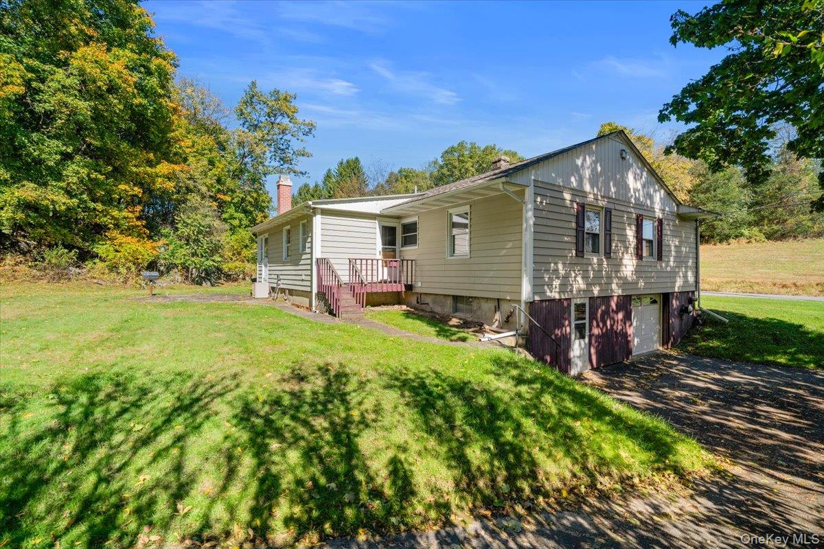 307 Big Island Road Warwick, NY 10921 - Photo 11 of 46 front view of a house with a yard
