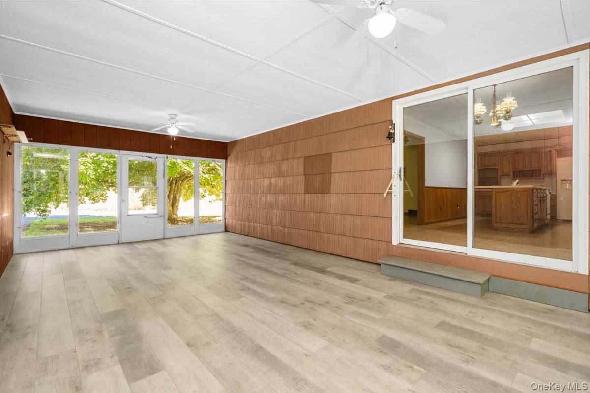 307 Big Island Road Warwick, NY 10921 - Photo 24 of 46 an empty room with windows and entrance
