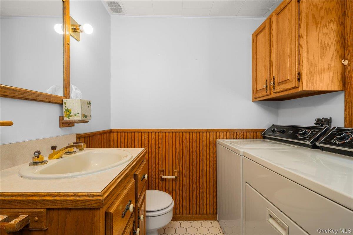 307 Big Island Road Warwick, NY 10921 - Photo 31 of 46 a bathroom with a sink a toilet and a mirror
