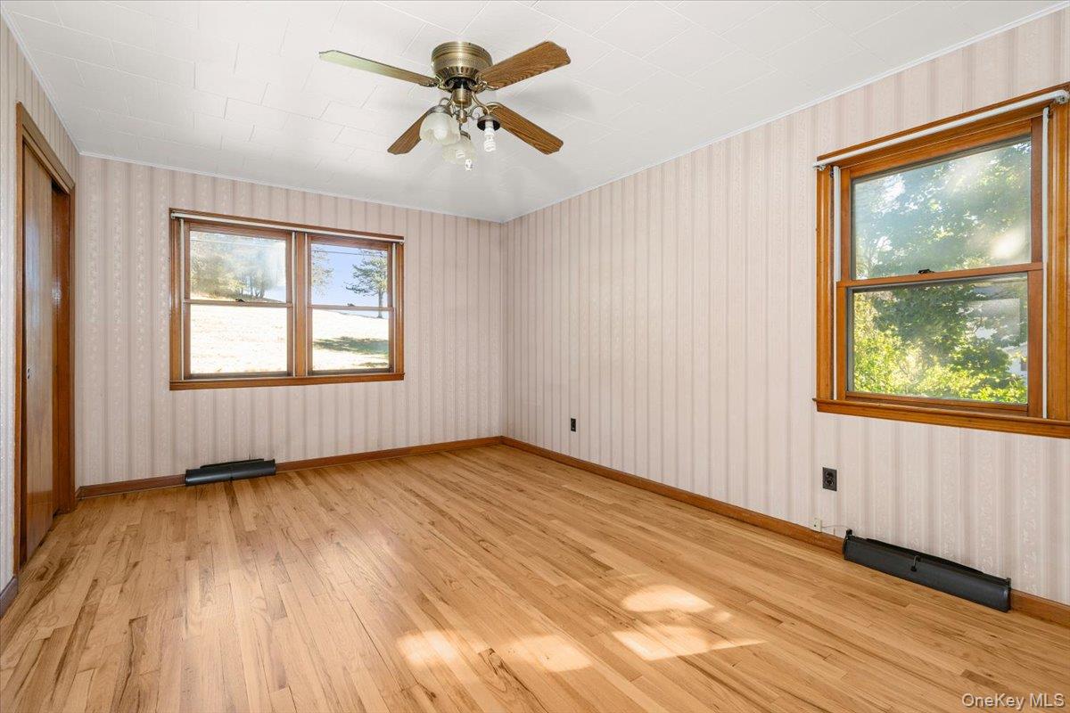 307 Big Island Road Warwick, NY 10921 - Photo 36 of 46 a view of an empty room window and wooden floor