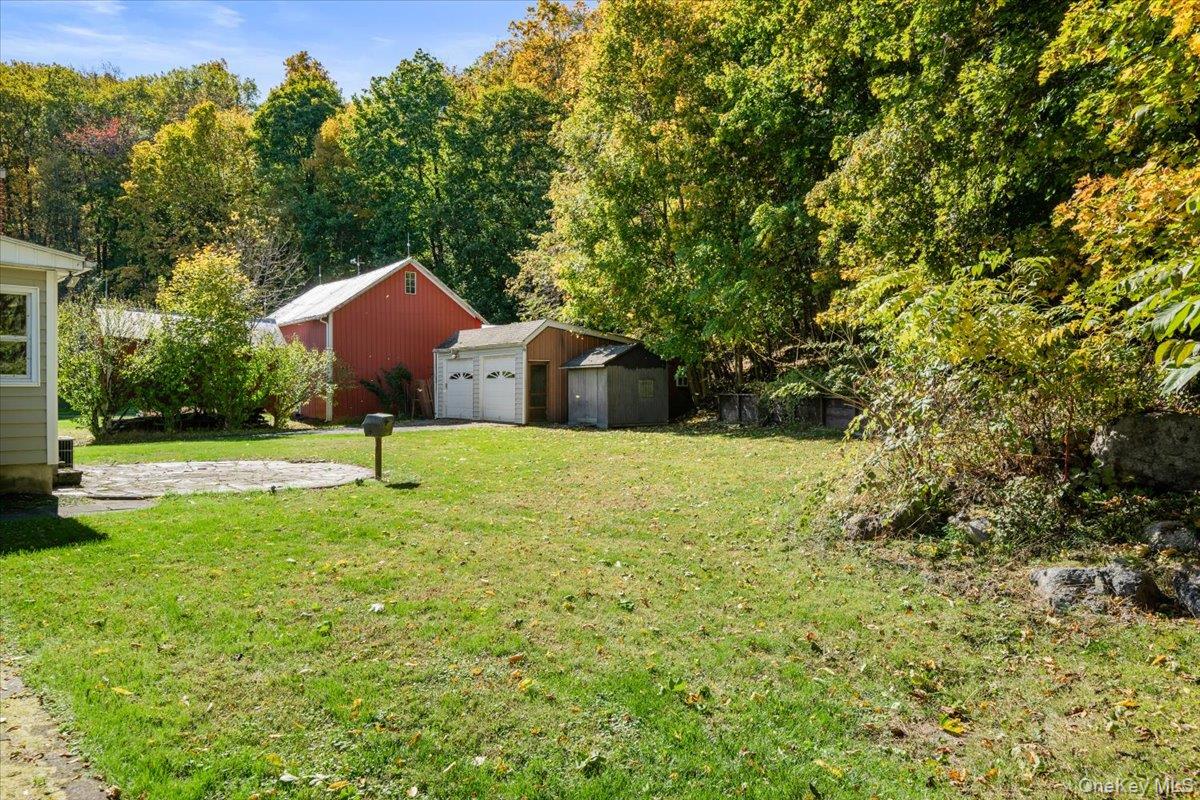 307 Big Island Road Warwick, NY 10921 - Photo 8 of 46 a front view of a house with a yard
