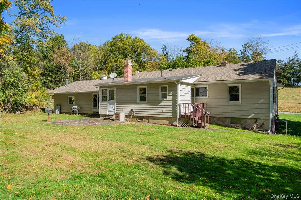 307 Big Island Road Warwick, NY 10921 - Photo 10 of 46 a view of a house with a backyard
