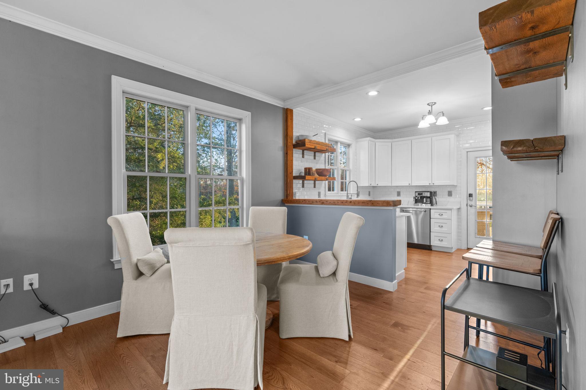 23375 Potts Mill Road Middleburg, VA 20117 - Photo 11 of 48 a dining room with furniture and a window