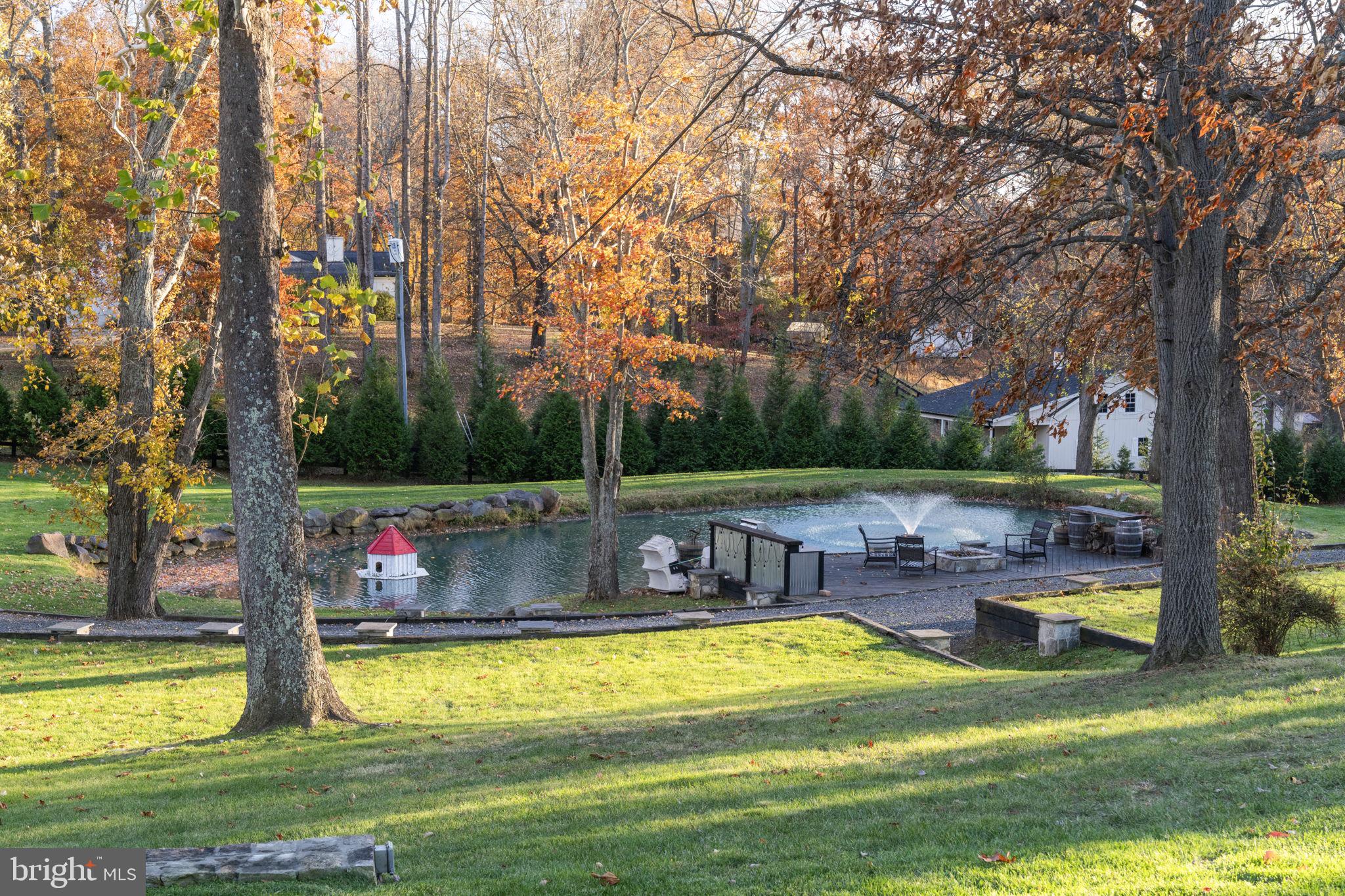 23375 Potts Mill Road Middleburg, VA 20117 - Photo 31 of 48 a view of swimming pool with a patio