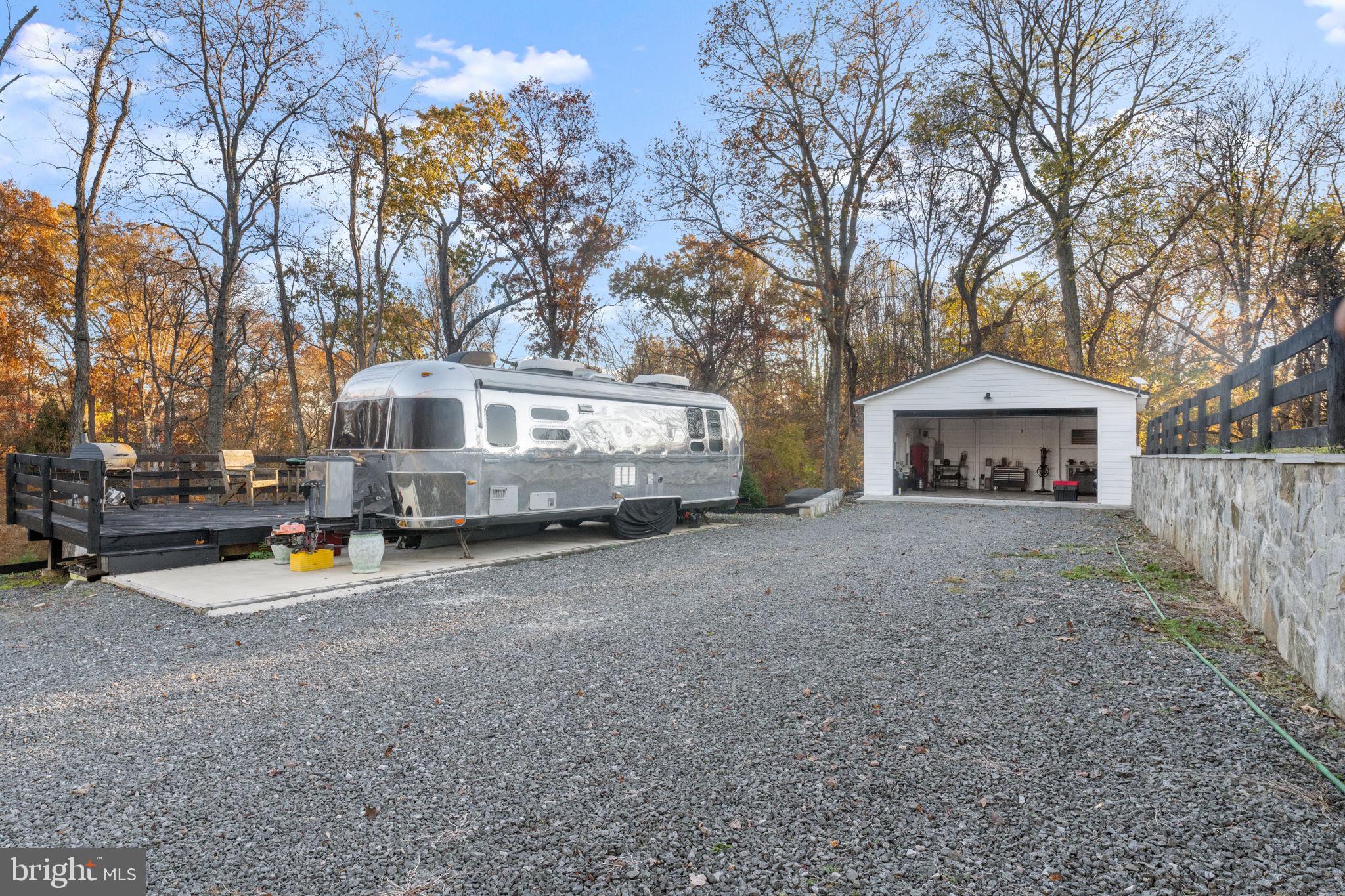 23375 Potts Mill Road Middleburg, VA 20117 - Photo 37 of 48 a house with outdoor seating space