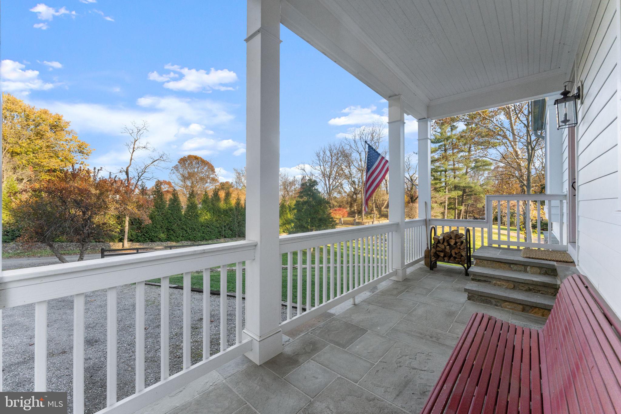 23375 Potts Mill Road Middleburg, VA 20117 - Photo 4 of 48 a view of a balcony with chairs