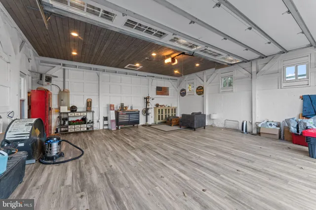 a view of a park with large trees