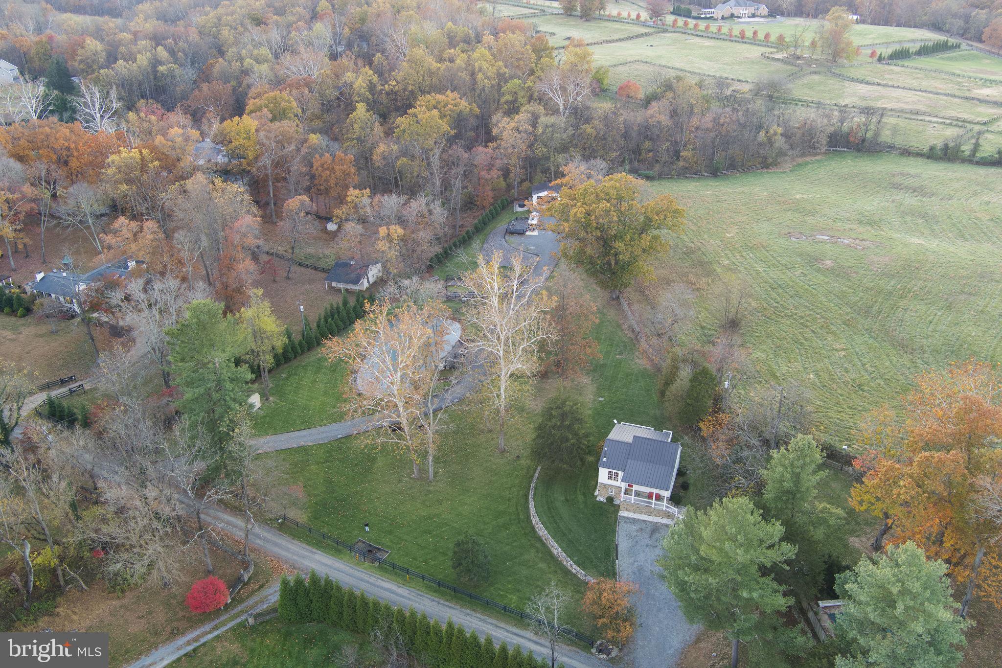 23375 Potts Mill Road Middleburg, VA 20117 - Photo 43 of 48 a view of a lake from a balcony