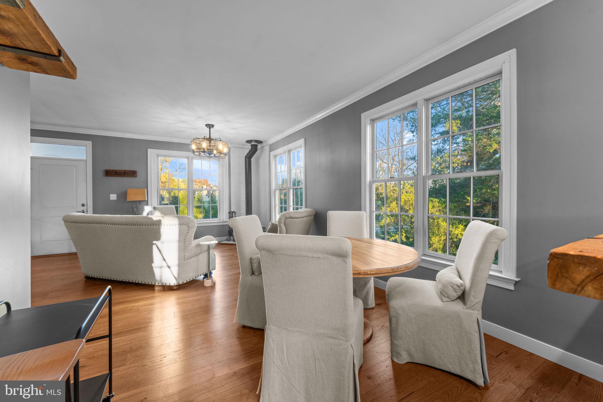 23375 Potts Mill Road Middleburg, VA 20117 - Photo 10 of 48 a living room with fireplace furniture and a large window
