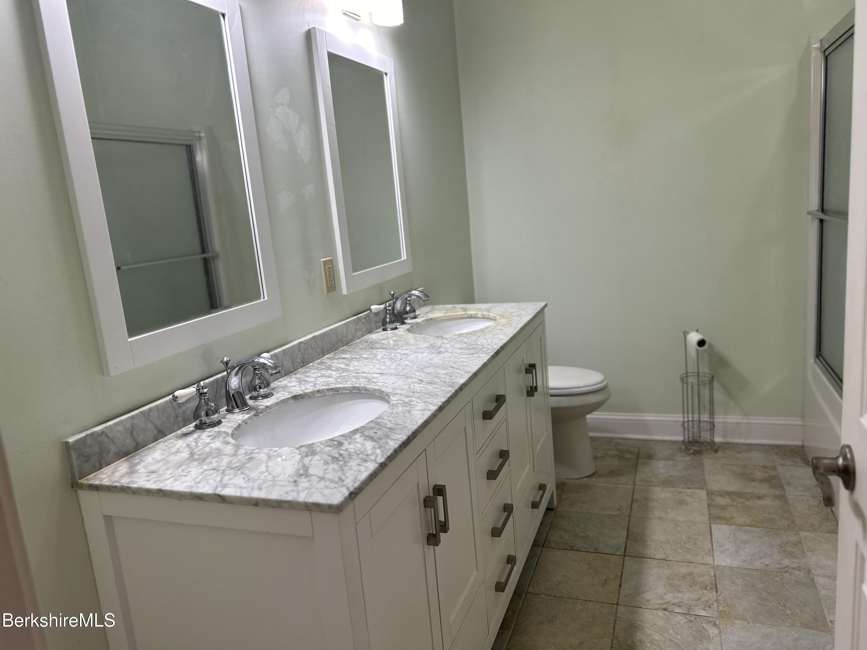 29 Main Street West Stockbridge, MA 01266 - Photo 49 of 51 a bathroom with a granite countertop sink and a mirror
