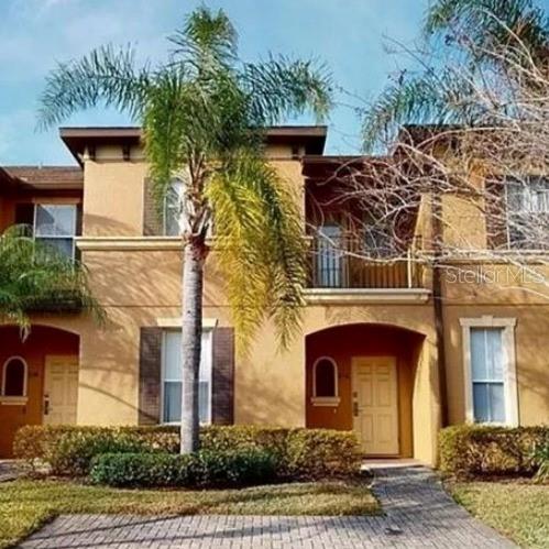 216 Calabria Avenue, Unit N/A Davenport, FL 33897 - Photo 1 of 36 front view of a house