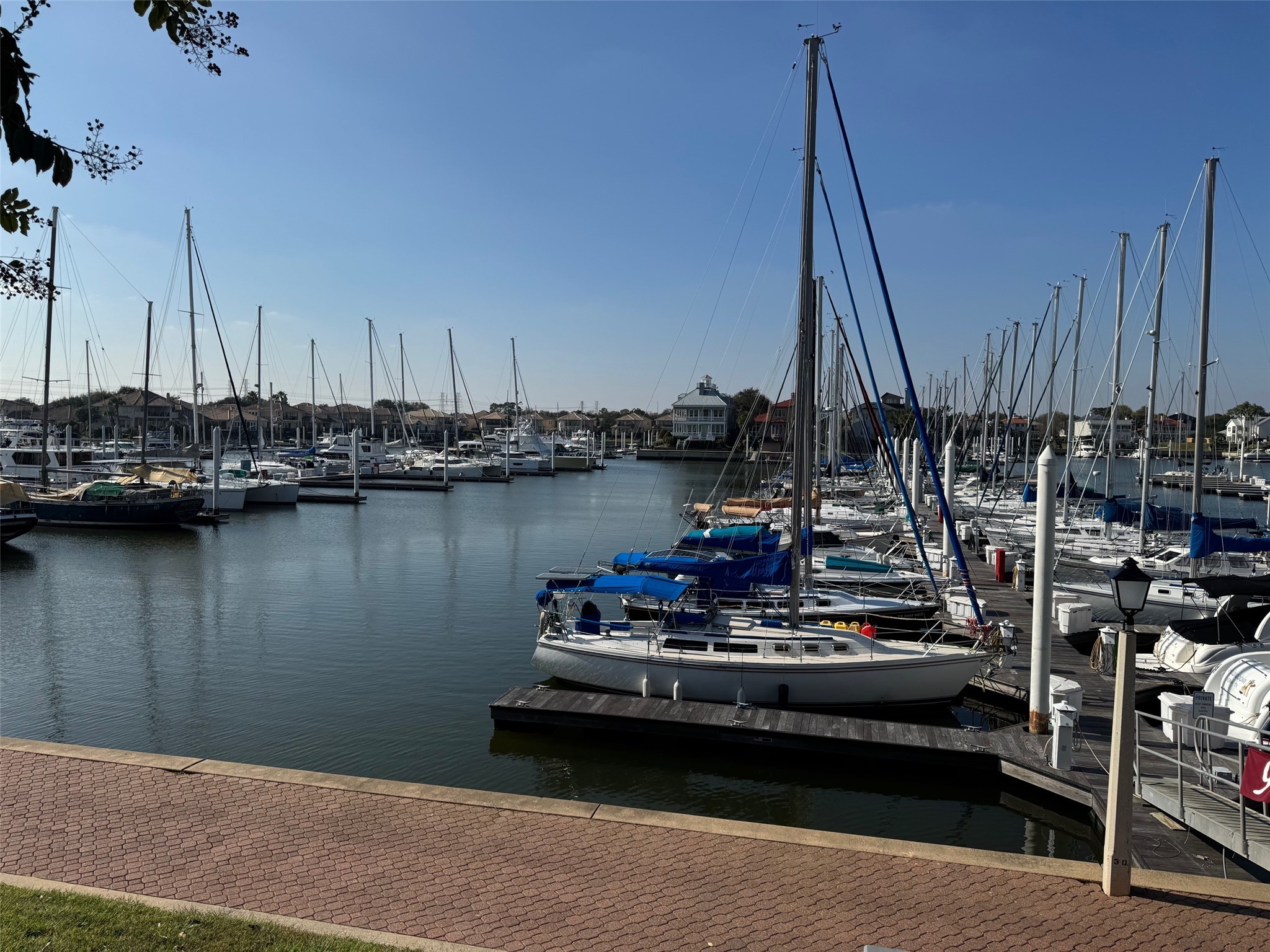 517 Mariners Drive Kemah, TX 77565 - Photo 23 of 26 a view of a lake with boats next to a bridge