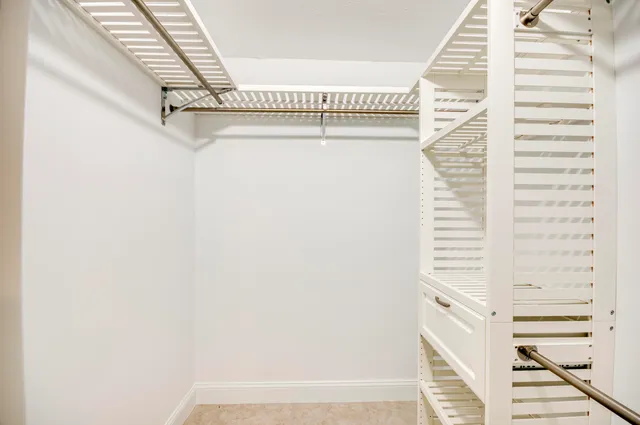 an empty room with a bathroom