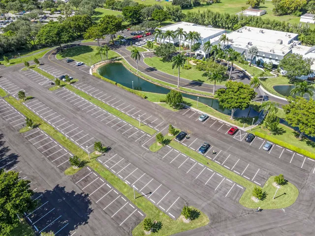 an aerial view of a swimming pool and outdoor space