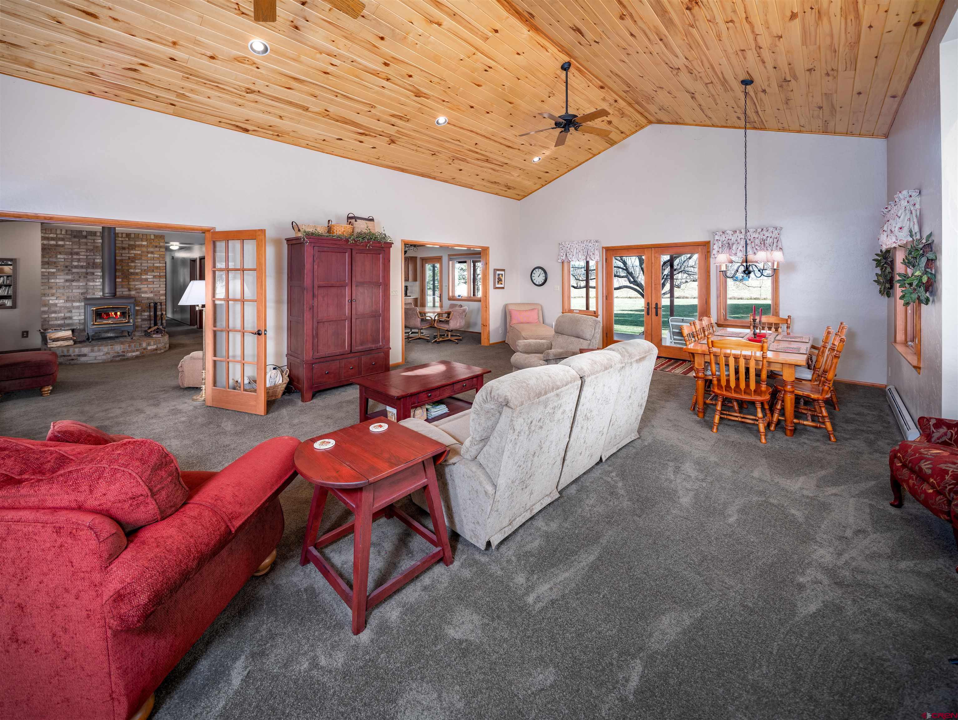 24620 Rd North Cortez, CO 81321 - Photo 16 of 40 a living room with furniture a air conditioner vent and a window