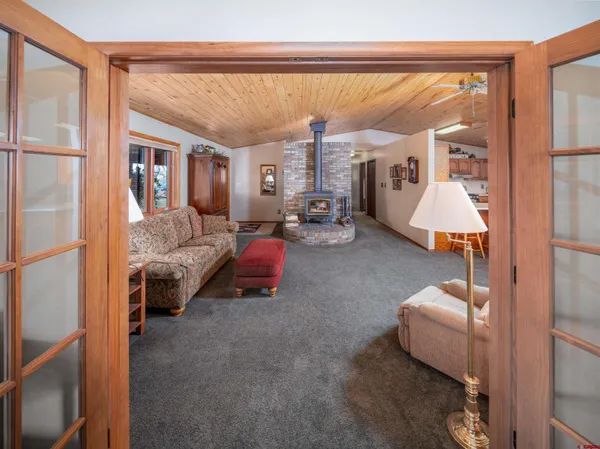 a kitchen with stainless steel appliances granite countertop a sink and cabinets