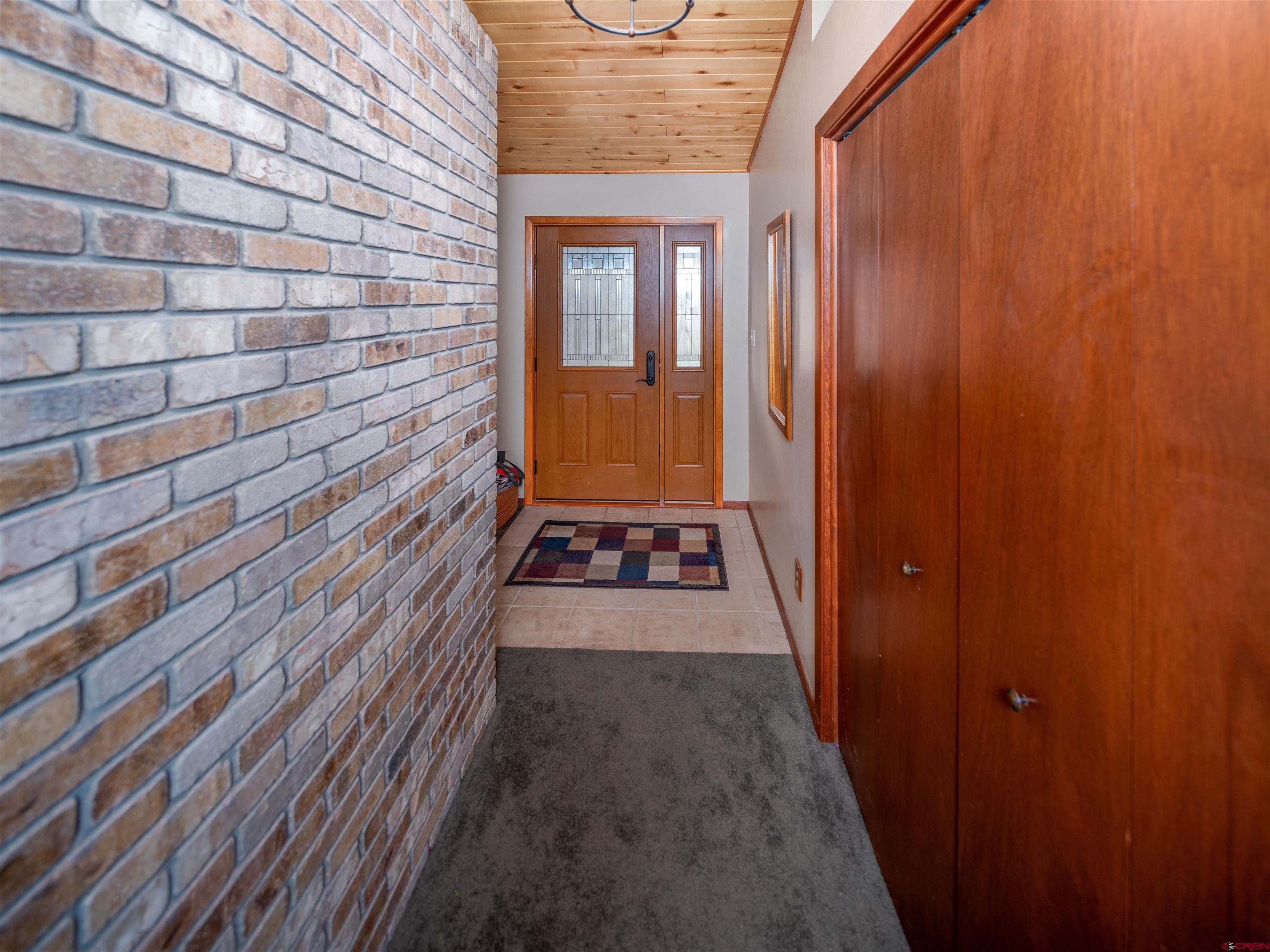 24620 Rd North Cortez, CO 81321 - Photo 32 of 40 a view of a door and wooden floor
